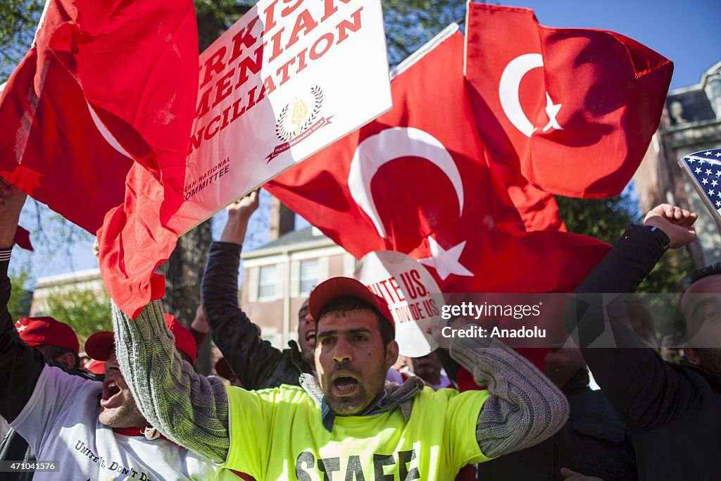 Turkish and Armenian people march at Turkish Embassy in Washington