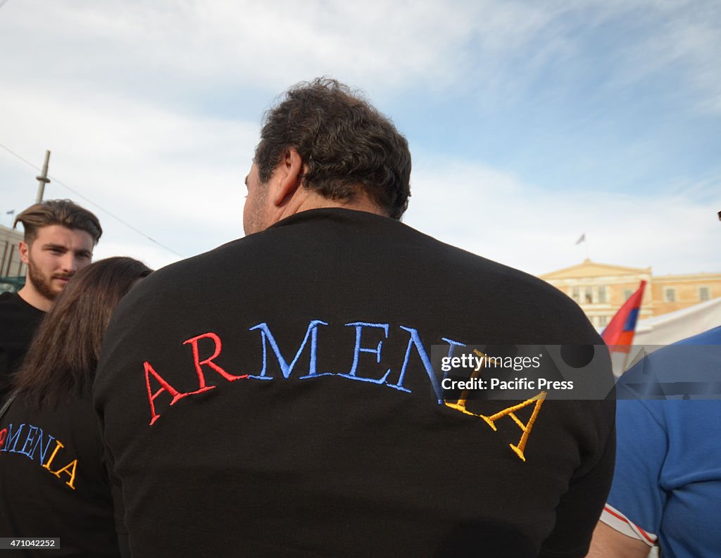 Demonstrator wears a t-shirt with the word Armenia on it.