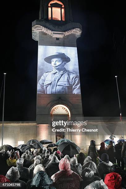 People attend a dawn service to commemorate the 100th anniversary of the Anzac Day at the Australian War Memorial on April 25, 2015 in...