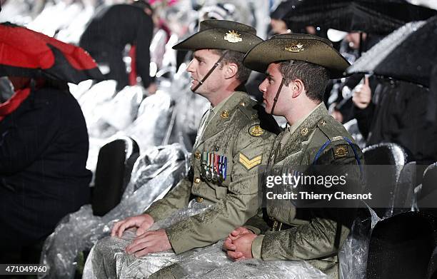 Australian soldiers attend a dawn service to commemorate the 100th anniversary of the Anzac Day at the Australian War Memorial on April 25, 2015 in...