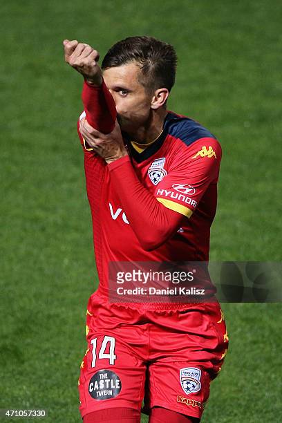 Cameron Watson of United reacts after scoring from a penalty during the round 26 A-League match between Adelaide United and Melbourne City at Coopers...