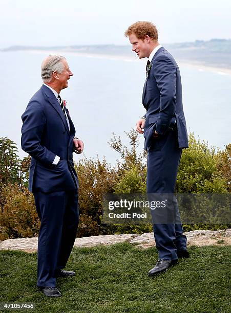 Prince Harry chats with Prince Charles, Prince of Wales during a visit to The Nek, a narrow stretch of ridge in the Anzac battlefield on the...