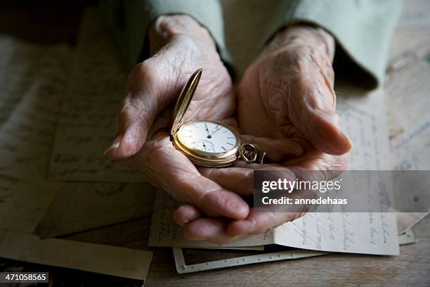 hands of time - pocket watch stock-fotos und bilder