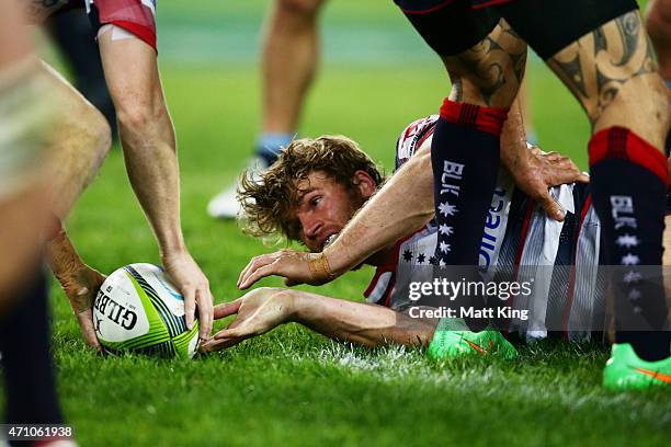 Dom Shipperley of the Rebels realeases the ball during the round 11 Super Rugby match between the Waratahs and the Rebels at ANZ Stadium on April 25,...