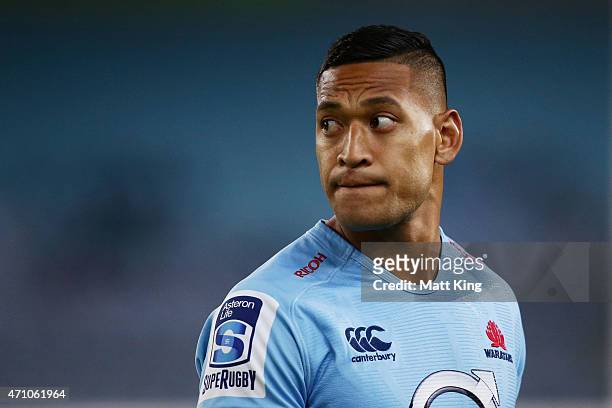 Israel Folau of the Waratahs looks on during the round 11 Super Rugby match between the Waratahs and the Rebels at ANZ Stadium on April 25, 2015 in...