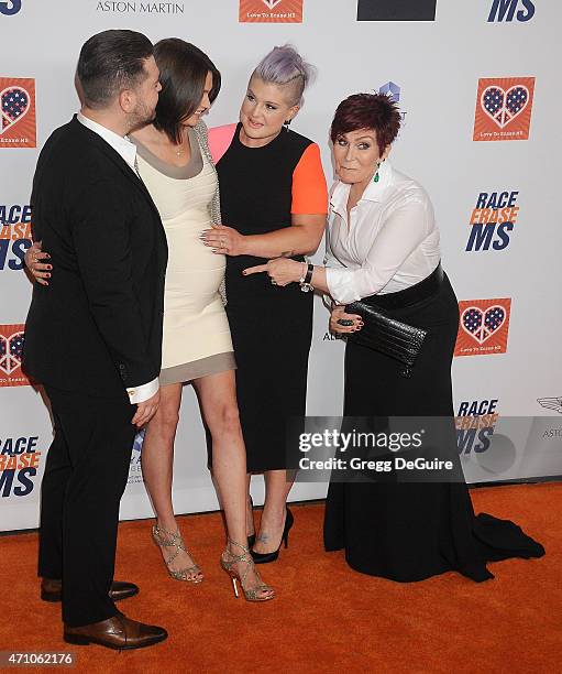 Jack Osbourne, wife Lisa Stelly, Kelly Osbourne and Sharon Osbourne arrive at the 22nd Annual Race To Erase MS at the Hyatt Regency Century Plaza on...