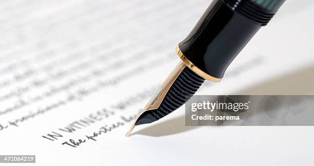 signing a contract - shorthand stock pictures, royalty-free photos & images