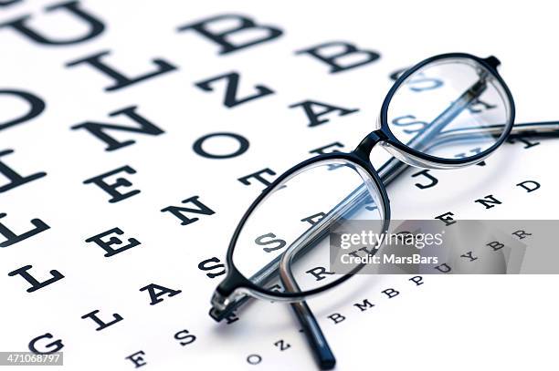 glasses and eyechart - eye test chart stock pictures, royalty-free photos & images
