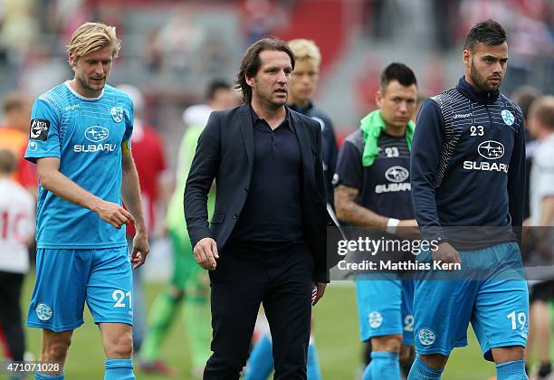 Marc Stein, manager Michael Zeyer and Fabio Leutenecker show their frustration after loosing the third league match between FC Energie Cottbus and SV...