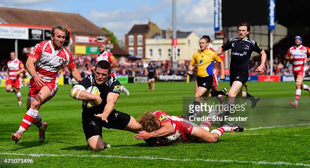 Falcons forward Mark Wilson crosses for the first Newcastle try during the Aviva Premiership match between Gloucester Rugby and Newcastle Falcons at...