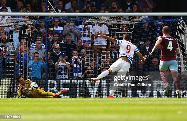 Adrian of West Ham saves a penalty from Charlie Austin of QPR during the Barclays Premier League match between Queens Park Rangers and West Ham...