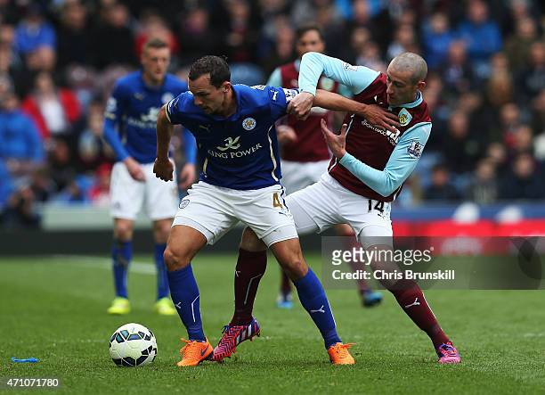 Daniel Drinkwater of Leicester City and David Jones of Burnley compete for the ball during the Barclays Premier League match between Burnley and...