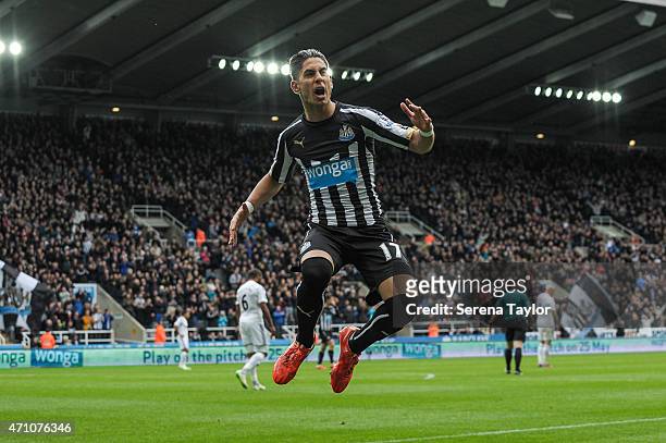 Ayoze Perez of Newcastle celebrates by jumping in the air after scoring the opening goal during the Barclays Premier League match between Newcastle...