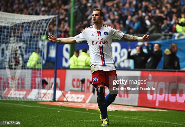 Pierre-Michel Lasogga of Hamburg celebrates scoring his second goal during the Bundeslga match between Hamburger SV and FC Augsburg at Imtech Arena...