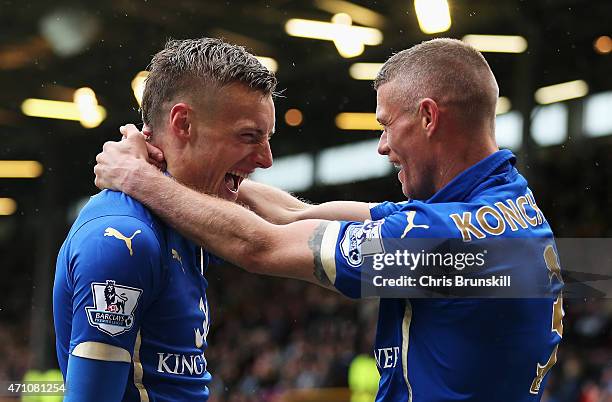 Jamie Vardy of Leicester City celebrates scoring their first goal with Paul Konchesky of Leicester City during the Barclays Premier League match...