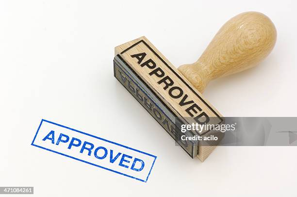 rubber stamp approved - allowing stockfoto's en -beelden