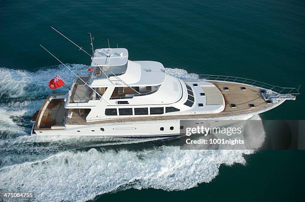 yacht - motorjacht stockfoto's en -beelden