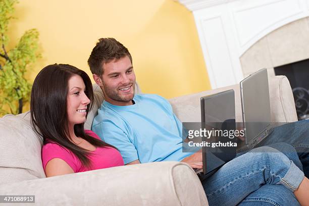 connected couple - gchutka stock pictures, royalty-free photos & images
