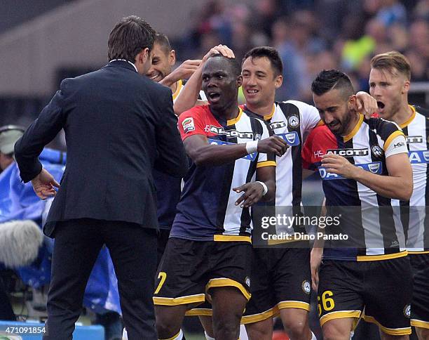 Emmanuel Agyemang Badu of Udinese Calcio celebrates with Head coach of Udinese Andrea Stramaccionii after scoring his teams second goal during the...