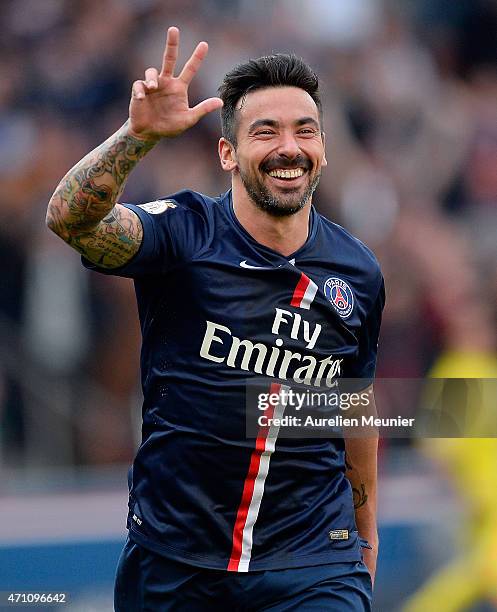 Ezequiel Lavezzi reacts after scoring his third goal during the Ligue 1 game between Paris Saint Germain and Llosc Lille at Parc des Princes on April...