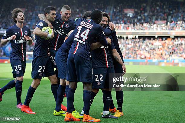 Players react after Ezequiel Lavezzi scored the 6th goal of the game during the Ligue 1 game between Paris Saint Germain and Llosc Lille at Parc des...