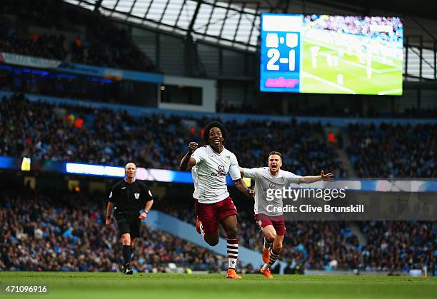 Carlos Sanchez of Aston Villa celebrates his goal with Tom Cleverley of Aston Villa during the Barclays Premier League match between Manchester City...