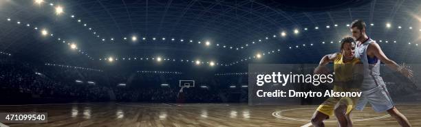 panorama-basketball-spiel moment - dribbling sports stock-fotos und bilder