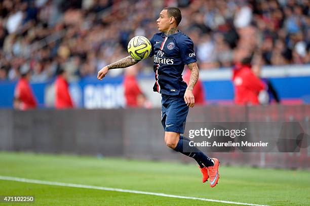 Gregory Van Der Wiel of PSG in action during the Ligue 1 game between Paris Saint Germain and Llosc Lille at Parc des Princes on April 25, 2015 in...