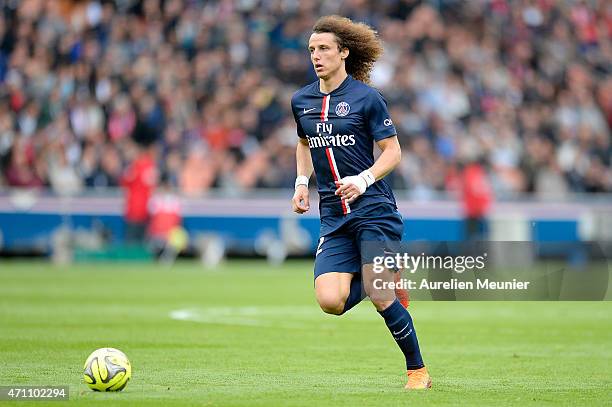 David Luiz of PSG in action during the Ligue 1 game between Paris Saint Germain and Llosc Lille at Parc des Princes on April 25, 2015 in Paris,...