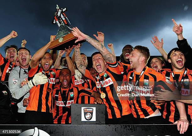 The Barnet Team celebrate with the trophy after clinching promotion during the Vanarama Football Conference League match between Barnet and Gateshead...