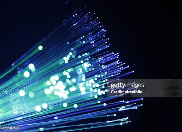 fiber lights - fibre stock pictures, royalty-free photos & images