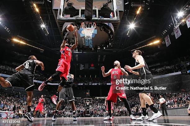 DeMarre Carroll of the Atlanta Hawks shoots against the Brooklyn Nets in Game Three of the Eastern Conference Quarterfinals during the 2015 NBA...