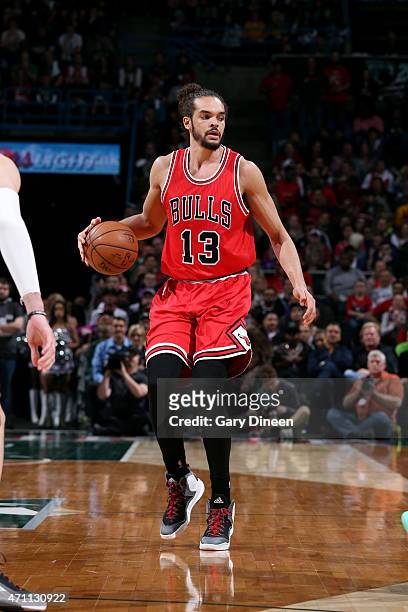Joakim Noah of the Chicago Bulls handles the ball against the Milwaukee Bucks in Game Four of the Eastern Conference Quarterfinals during the 2015...