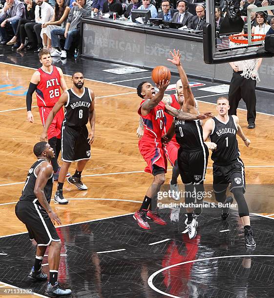 Jeff Teague of the Atlanta Hawks shoots against the Brooklyn Nets in Game Three of the Eastern Conference Quarterfinals during the 2015 NBA Playoffs...