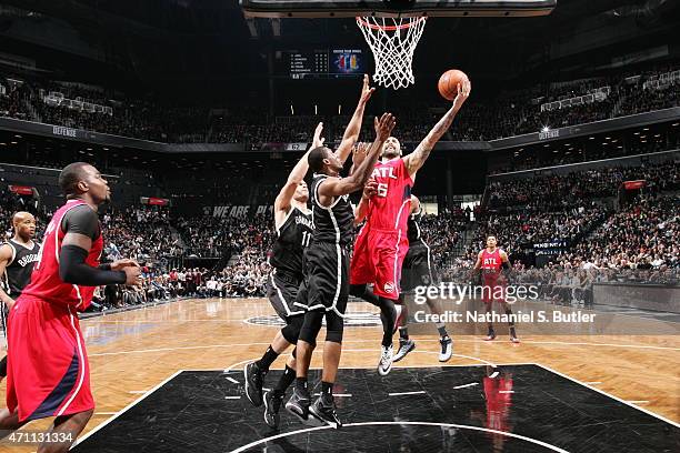 Pero Antic of the Atlanta Hawks shoots against the Brooklyn Nets in Game Three of the Eastern Conference Quarterfinals during the 2015 NBA Playoffs...