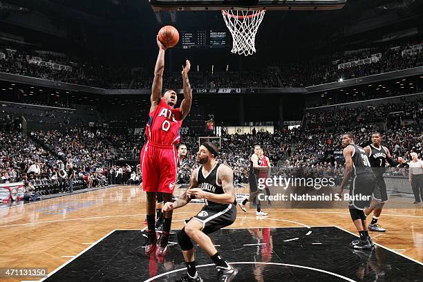 Jeff Teague of the Atlanta Hawks shoots against the Brooklyn Nets in Game Three of the Eastern Conference Quarterfinals during the 2015 NBA Playoffs...