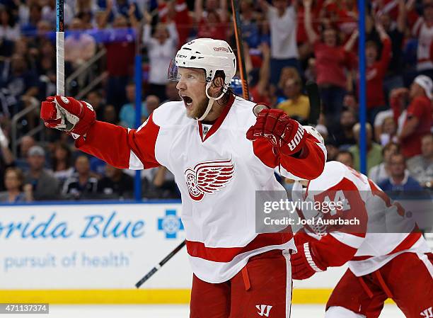 Justin Abdelkader of the Detroit Red Wings celebrates the goal by Riley Sheahan against the Tampa Bay Lightning during the first period in Game Five...