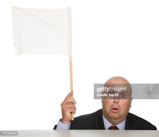 waving a white flag to show a man defeated - surrendering stockfoto's en -beelden