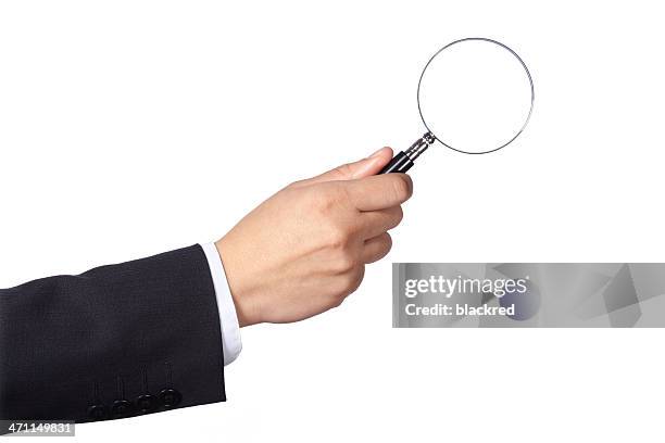 magnifying glass - mouw stockfoto's en -beelden