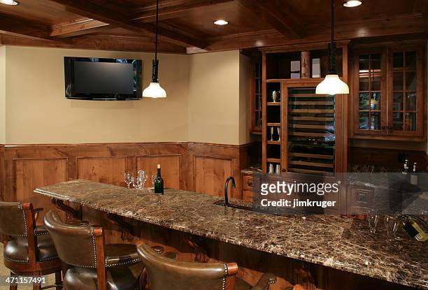 lower level bar. - basement stock pictures, royalty-free photos & images