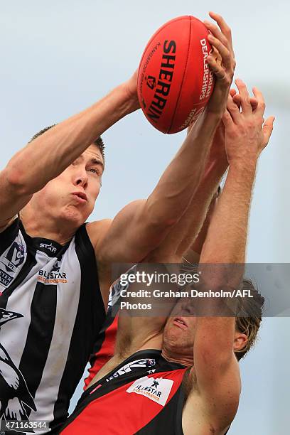 Mason Cox of the Collingwood Magpies takes a mark during the round two VFL match between the Essendon Bombers and the Collingwood Magpies at Windy...