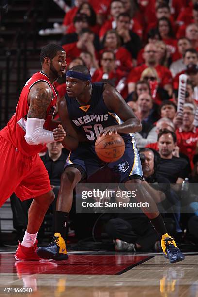 Zach Randolph of the Memphis Grizzlies handles the ball against LaMarcus Aldridge of the Portland Trail Blazers in Game Three of the Western...