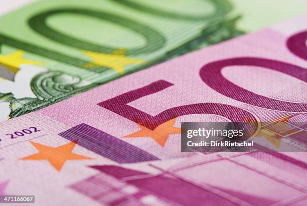 detail of 100€ and 500€ bill. - five hundred euro banknote stock pictures, royalty-free photos & images