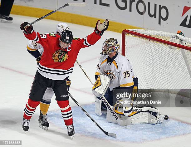 Jonathan Toews of the Chicago Blackhawks celebrates after the game-winning goal gets past Pekka Rinne of the Nashville Predators in the third period...