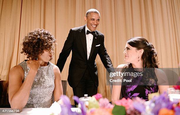 First Lady Michelle Obama, President Barack Obama and comedienne Cecily Strong of the Saturday Night Live show chat during the annual White House...