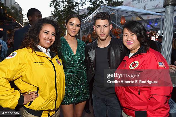 Olivia Culpo and singer Nick Jonas pose with City Year AmeriCorps members at City Year Los Angeles Spring Break at Sony Studios on April 25, 2015 in...