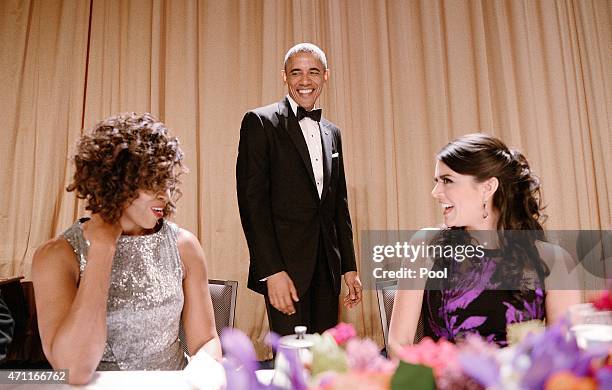 First Lady Michelle Obama, President Barack Obama and comedienne Cecily Strong of the Saturday Night Live show chat during the annual White House...
