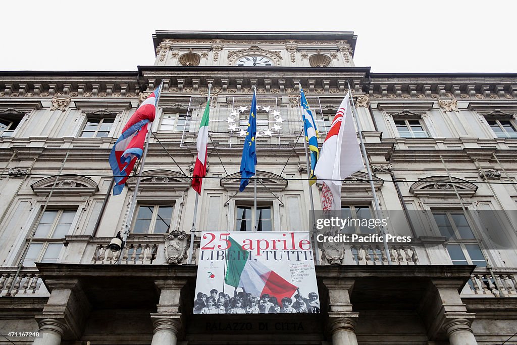 Poster and laurel wreath in front of the Town Hall for the...