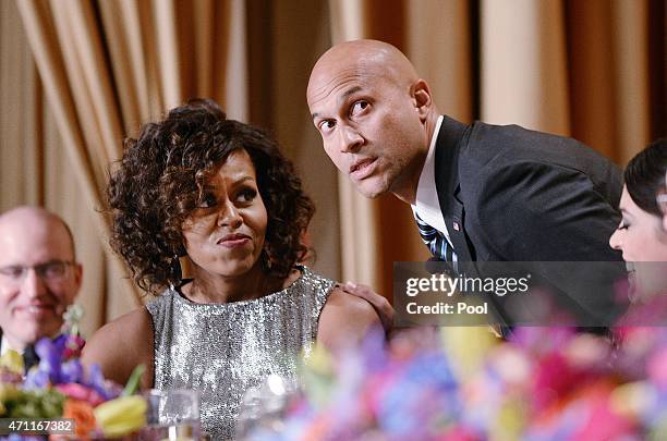 First Lady Michelle Obama and the presidents translator, Luther , as portrayed by comedian Keegan-Michael Key, look on as President Barack Obama...