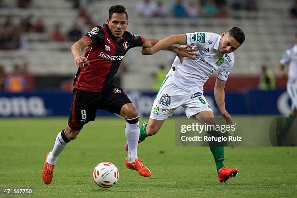 Aldo Leao of Atlas fights for the ball with Jose Maria Cardenas of Leon during a match between Atlas and Leon as part of 15th round of Clausura 2015...